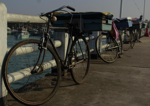 Resting Wheels by the Pier