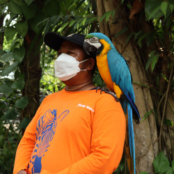 Man carrying the nature on his shoulder