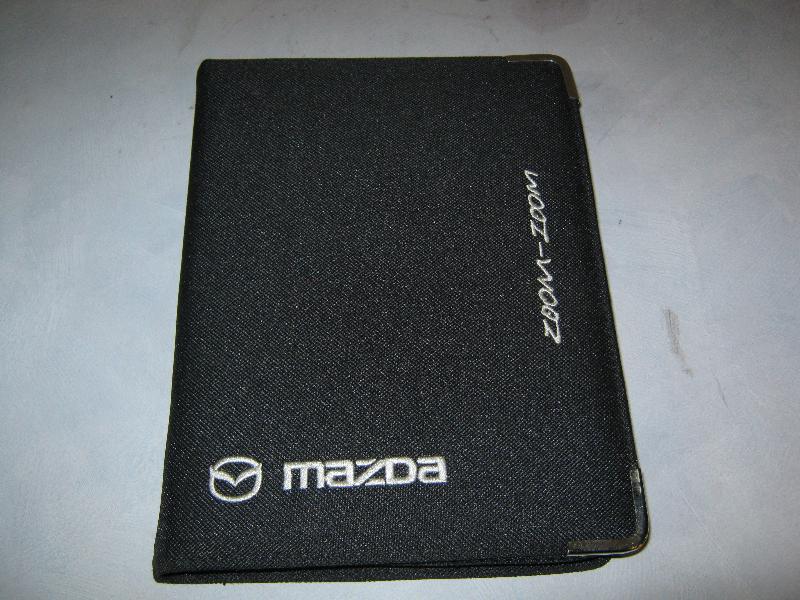 View Auto part Owners Handbook Mazda 323 2003
