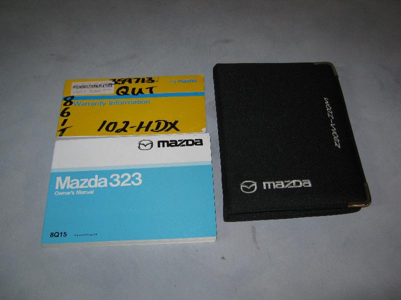 View Auto part Owners Handbook Mazda 323 2003