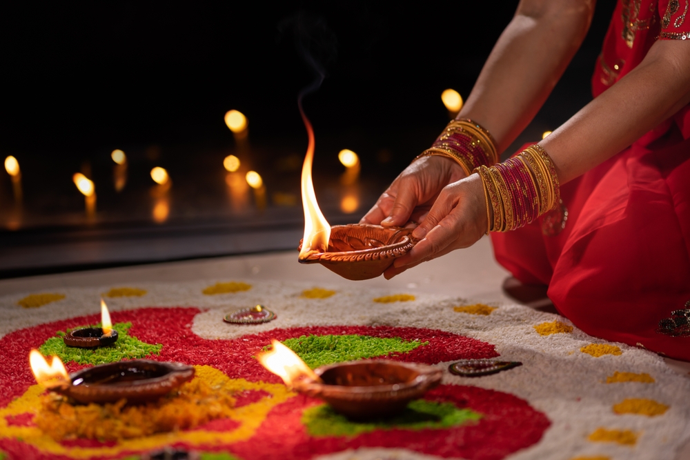Traditional diya lamps lit during diwali celebration
