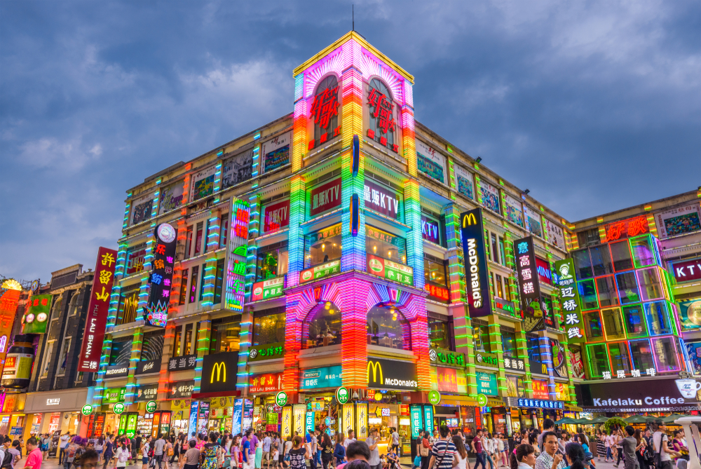 Pedestrians pass through Shangxiajiu Pedestrian Street