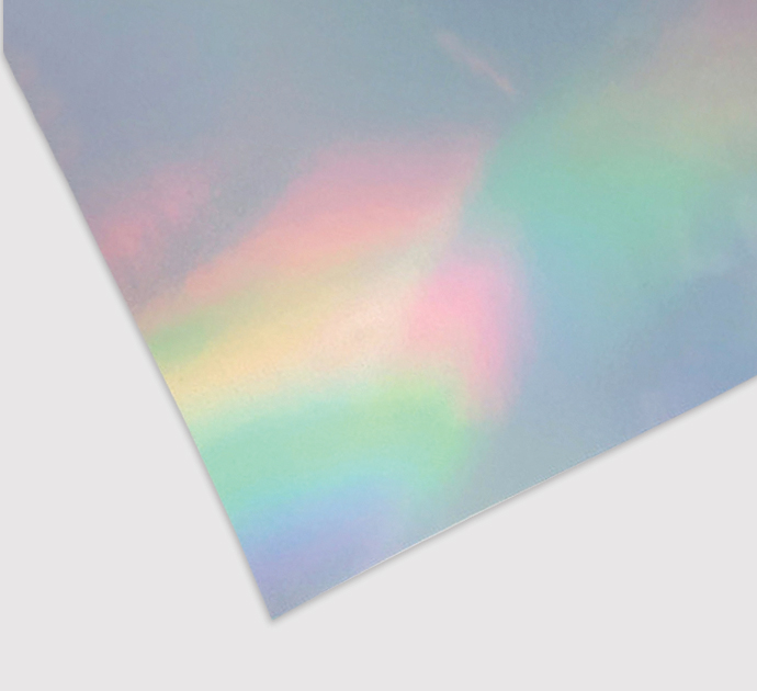 Hologram sticker printing material with reflective rainbow finish for stickers and specialty print projects