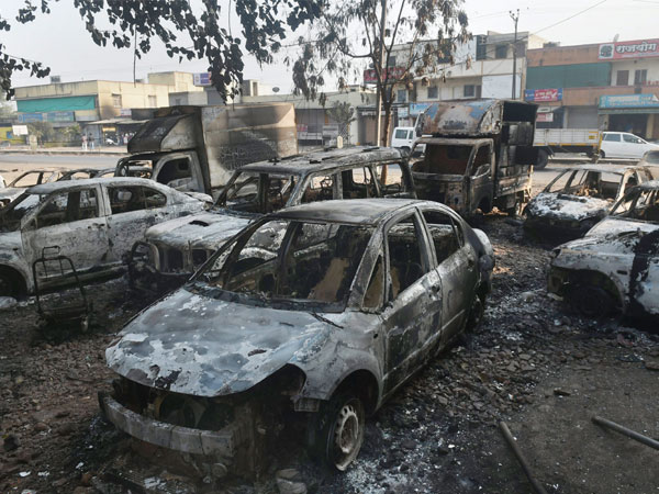 Maharashtra burns as Pune caste clash fire spreads Maharashtra burns as Pune caste clash fire spreads