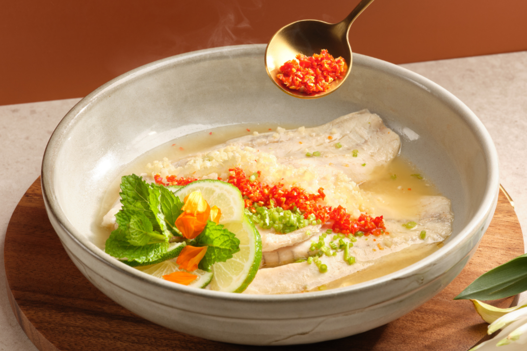 steamed seabass fillet with superior soy sauce or chili lime garlic sauce