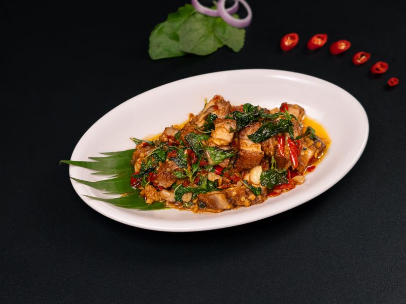 Stir-fried roasted pork belly with hot basil