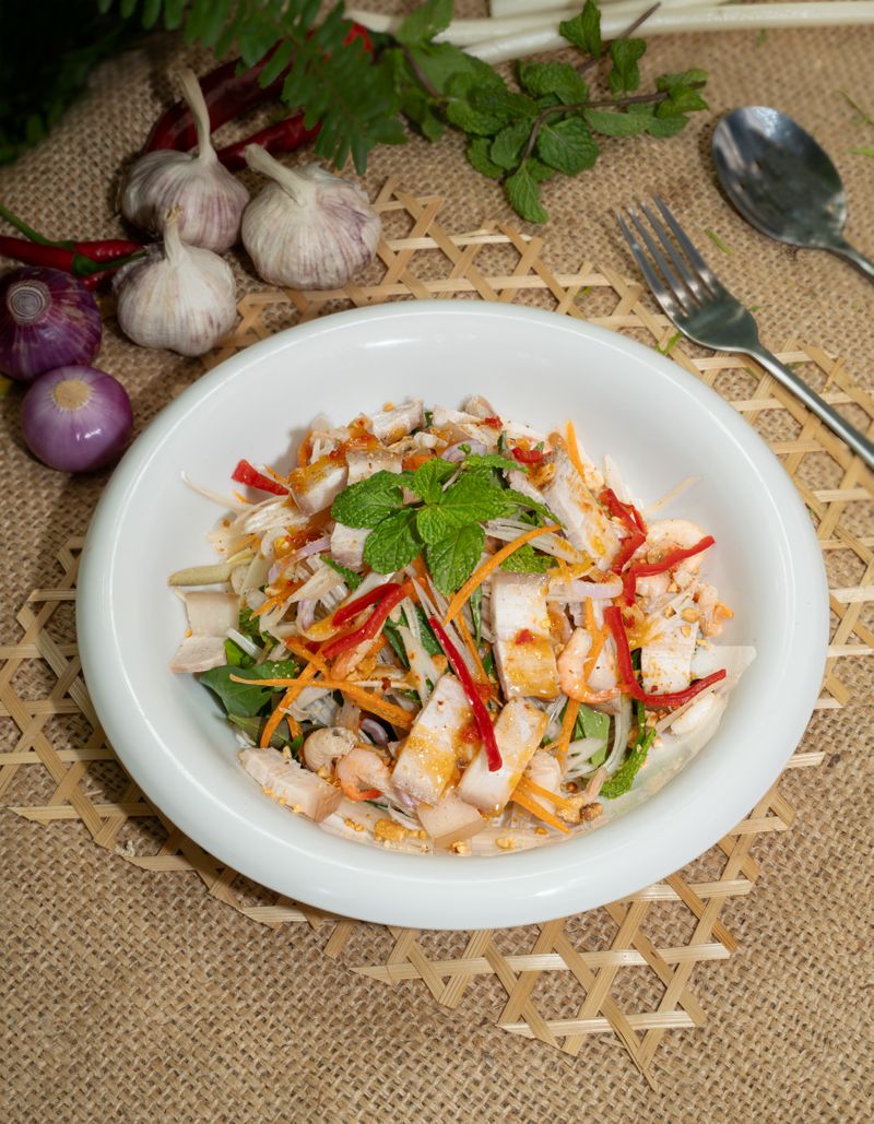 Lotus stem salad with Pork belly and river shrimp