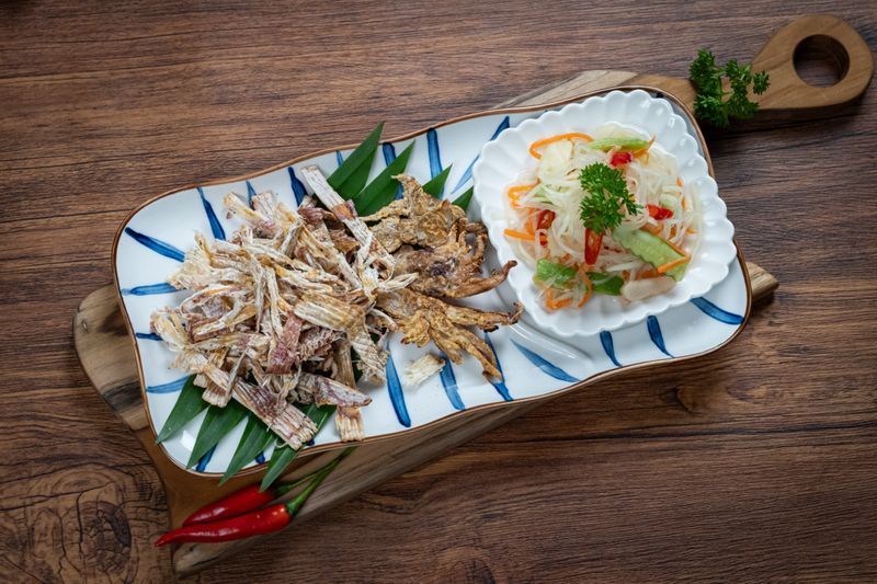 Dried squid with green papaya pickle
