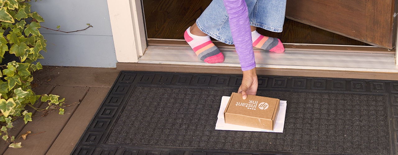 HP Instant Ink box delivered to a doorstep