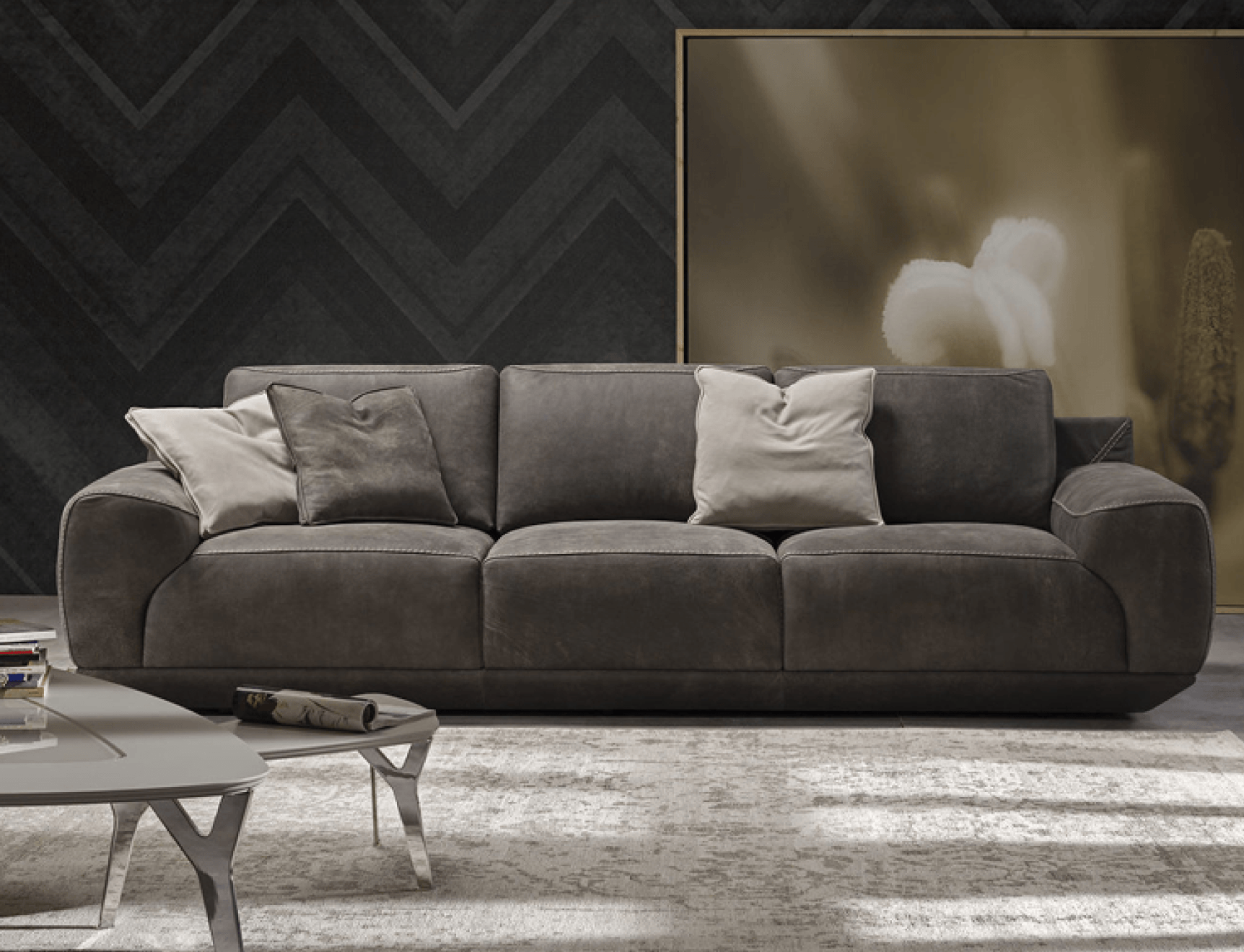 Dark grey three-seater sofa in a living room