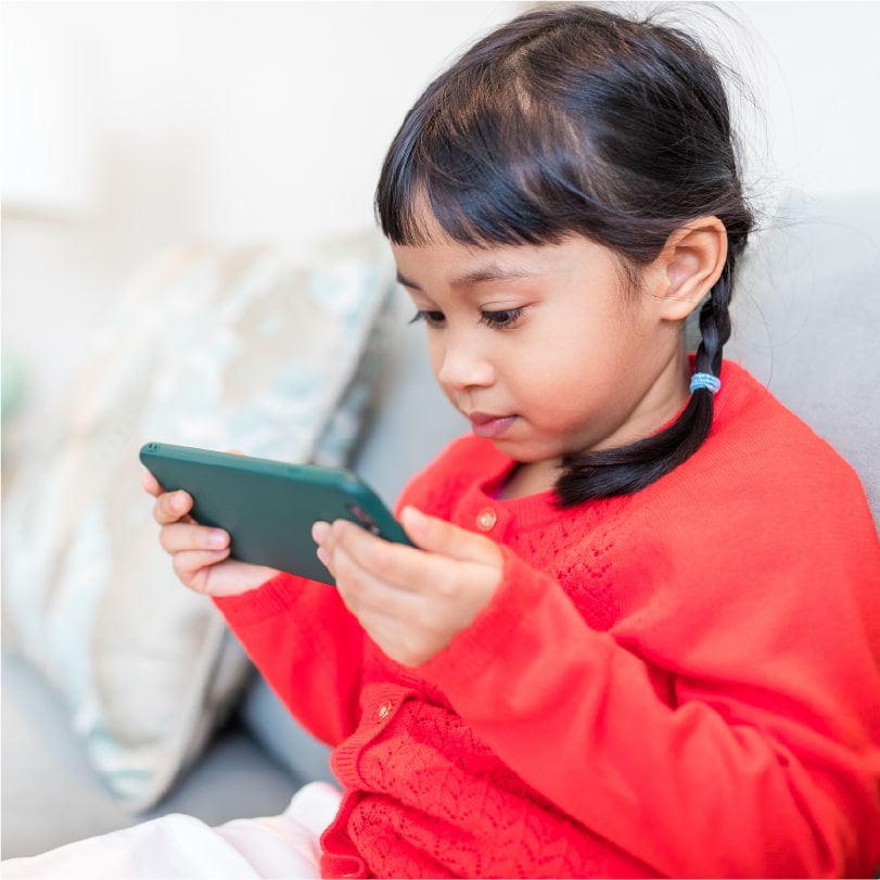 Primary school student using a phone