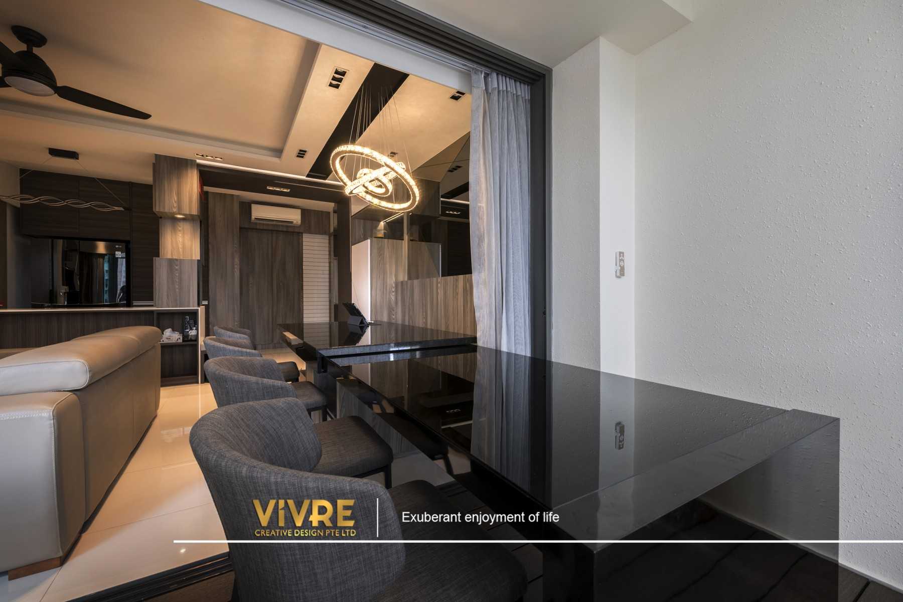 Modern Dining Room with Cove Lighting and Chandelier