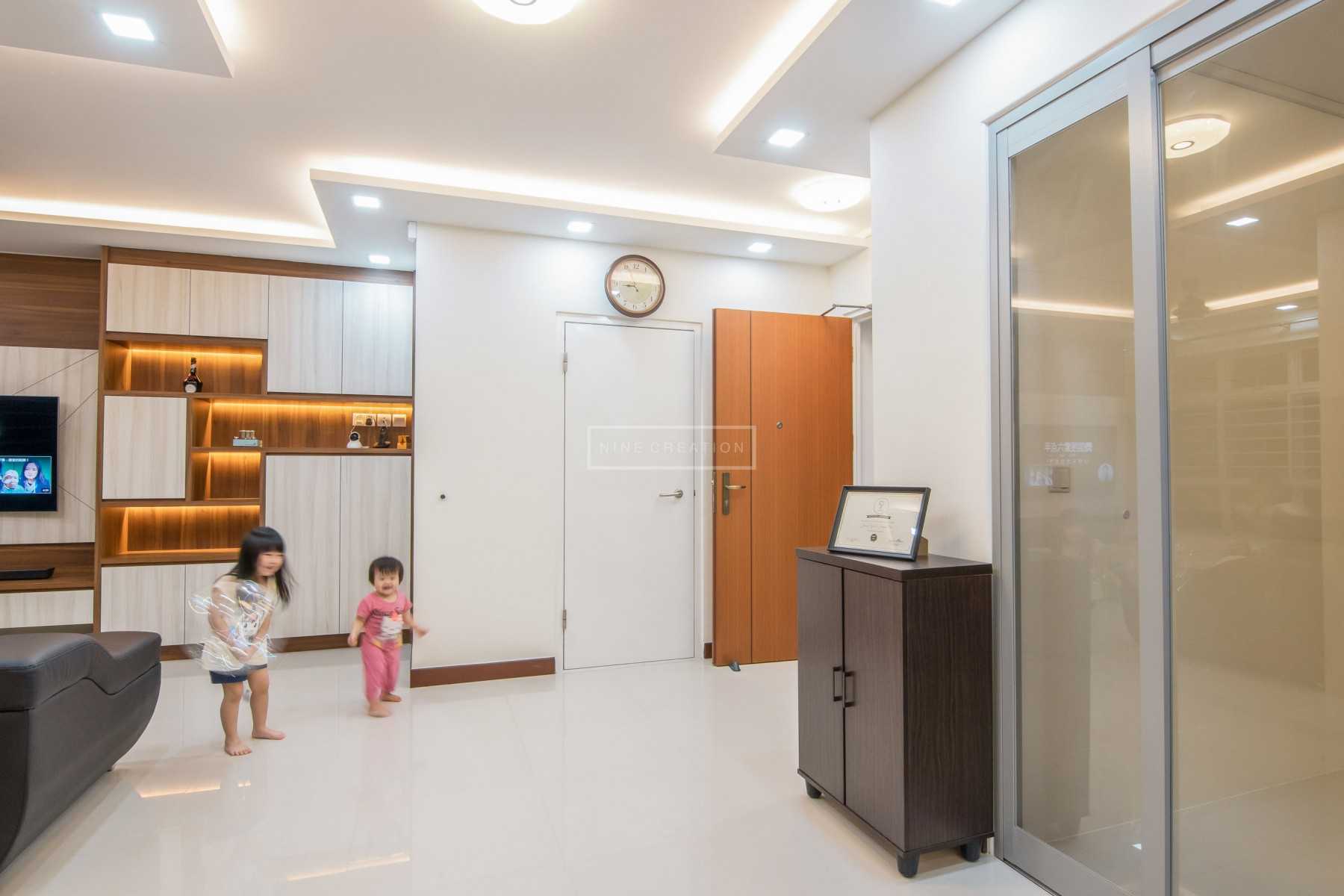 Scandinavian Foyer with TV Console and Feature Wall