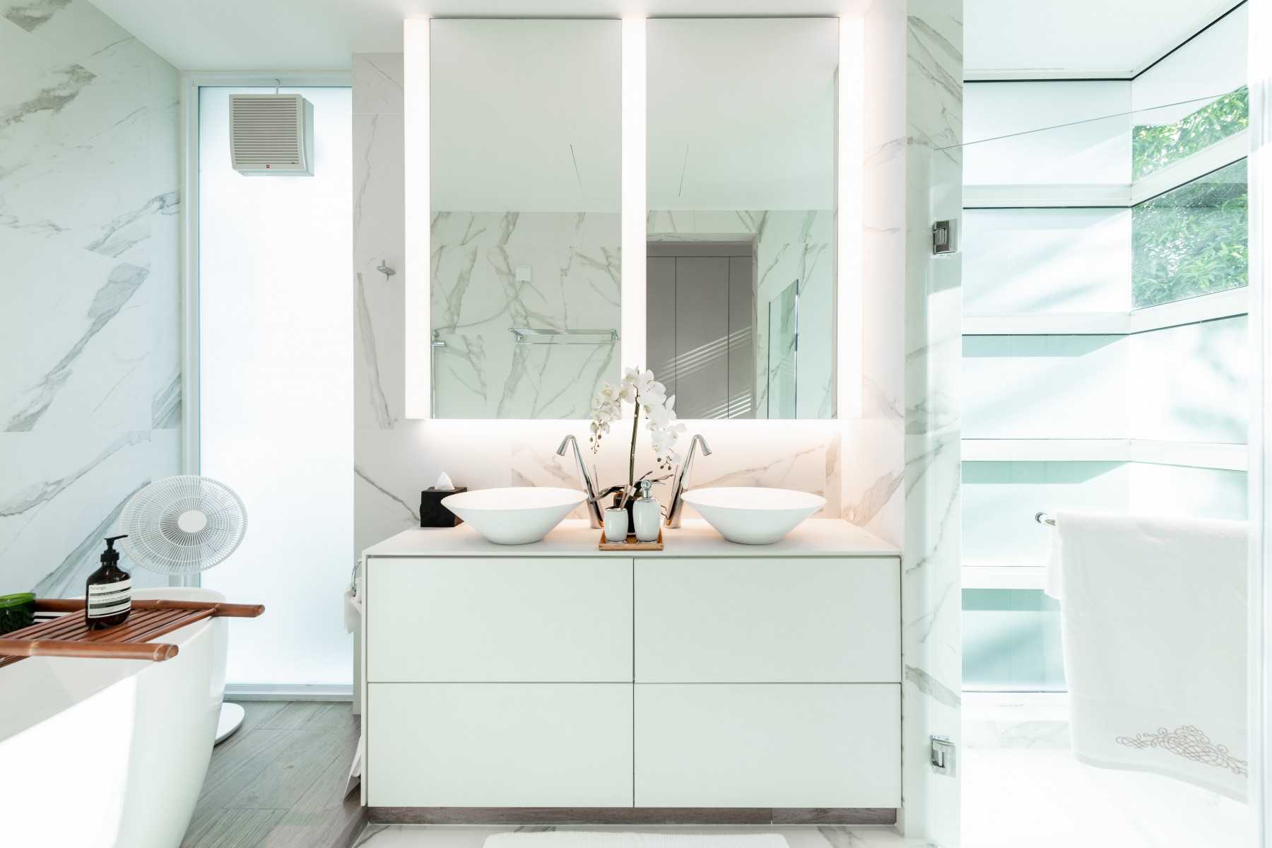 Scandinavian Bathroom with Countertop and Feature Wall