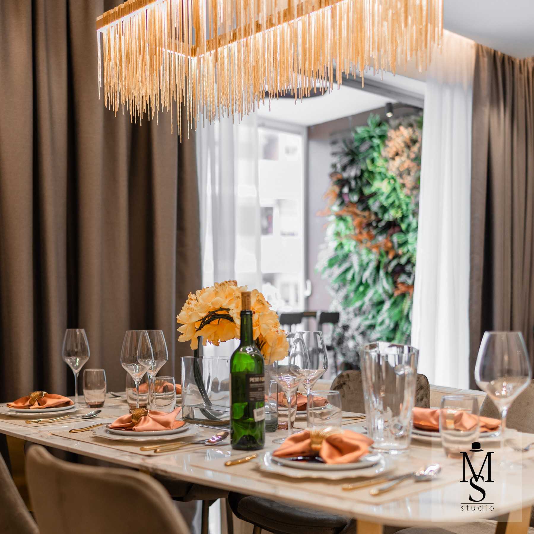 Modern Dining Room with Ceiling Light and Chandelier
