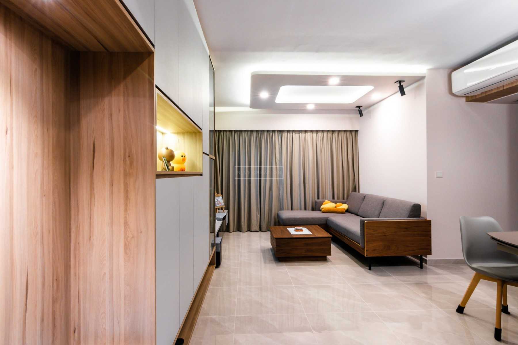 Scandinavian Living Room with Bookshelf and Homogeneous Tiles
