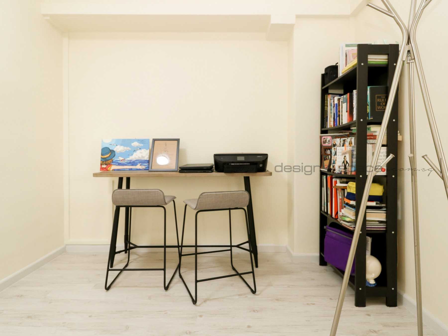 Minimalist Study with Bookshelf and Storage Cabinets