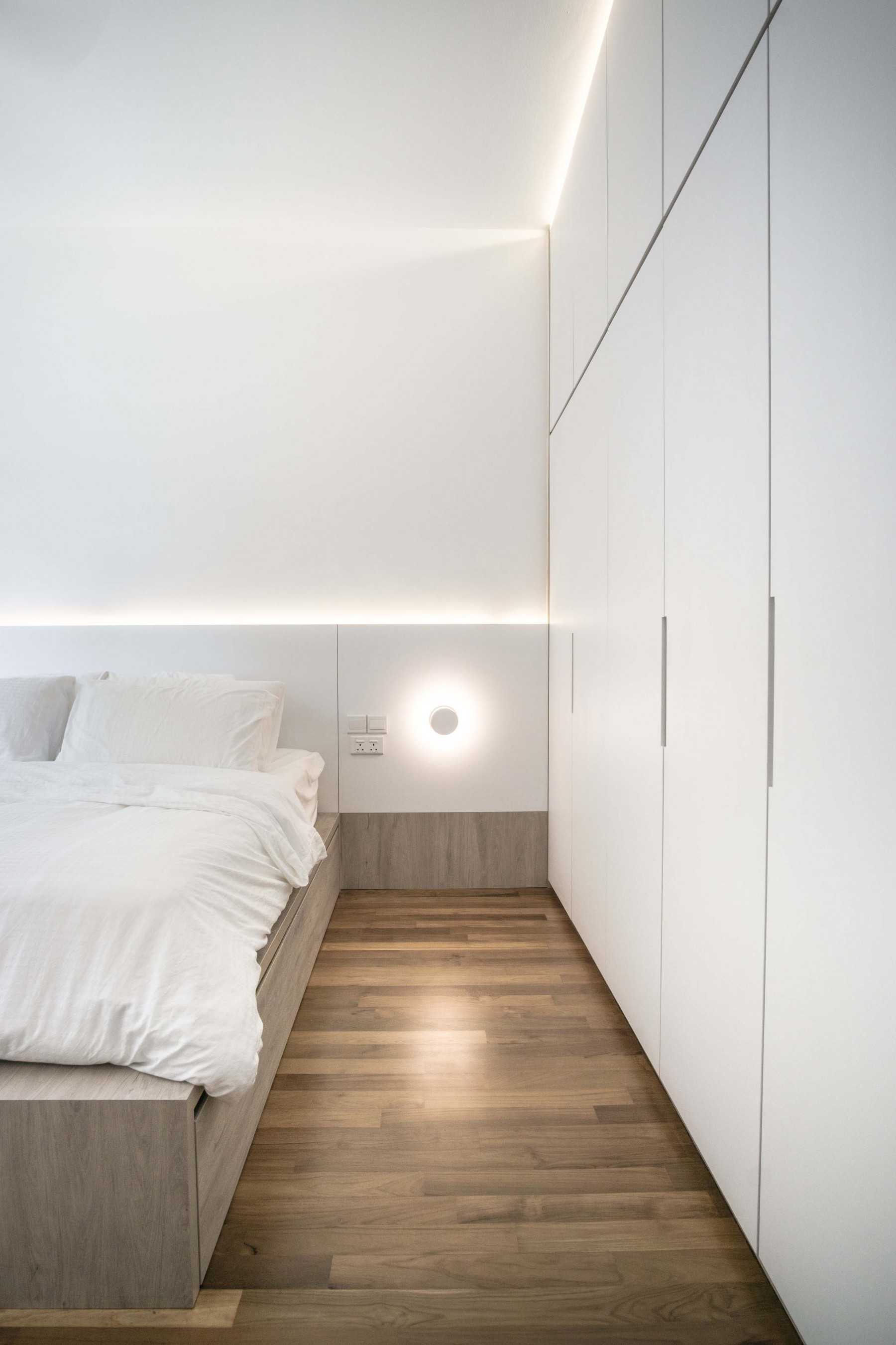 Modern Bedroom with Wardrobe and Bedside Table