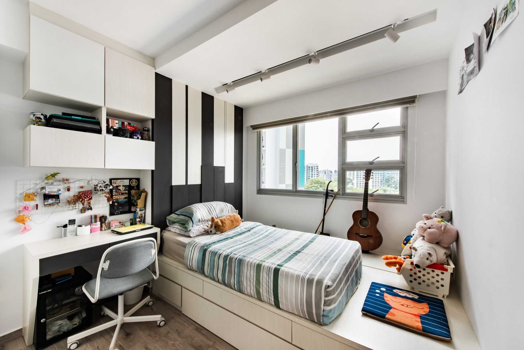 Contemporary Bedroom with Bookshelf and Platform Bed