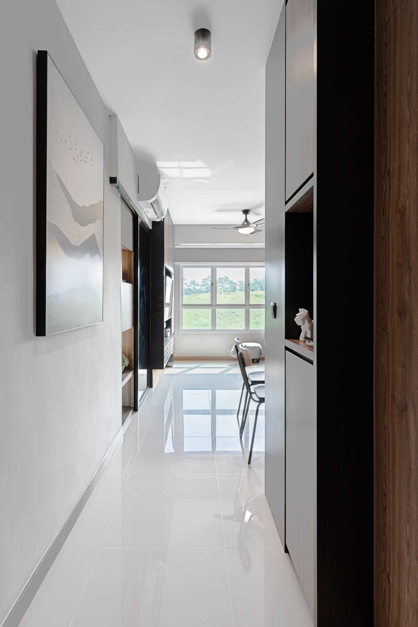 Modern Entryway with Paintings and Shoe Cabinets