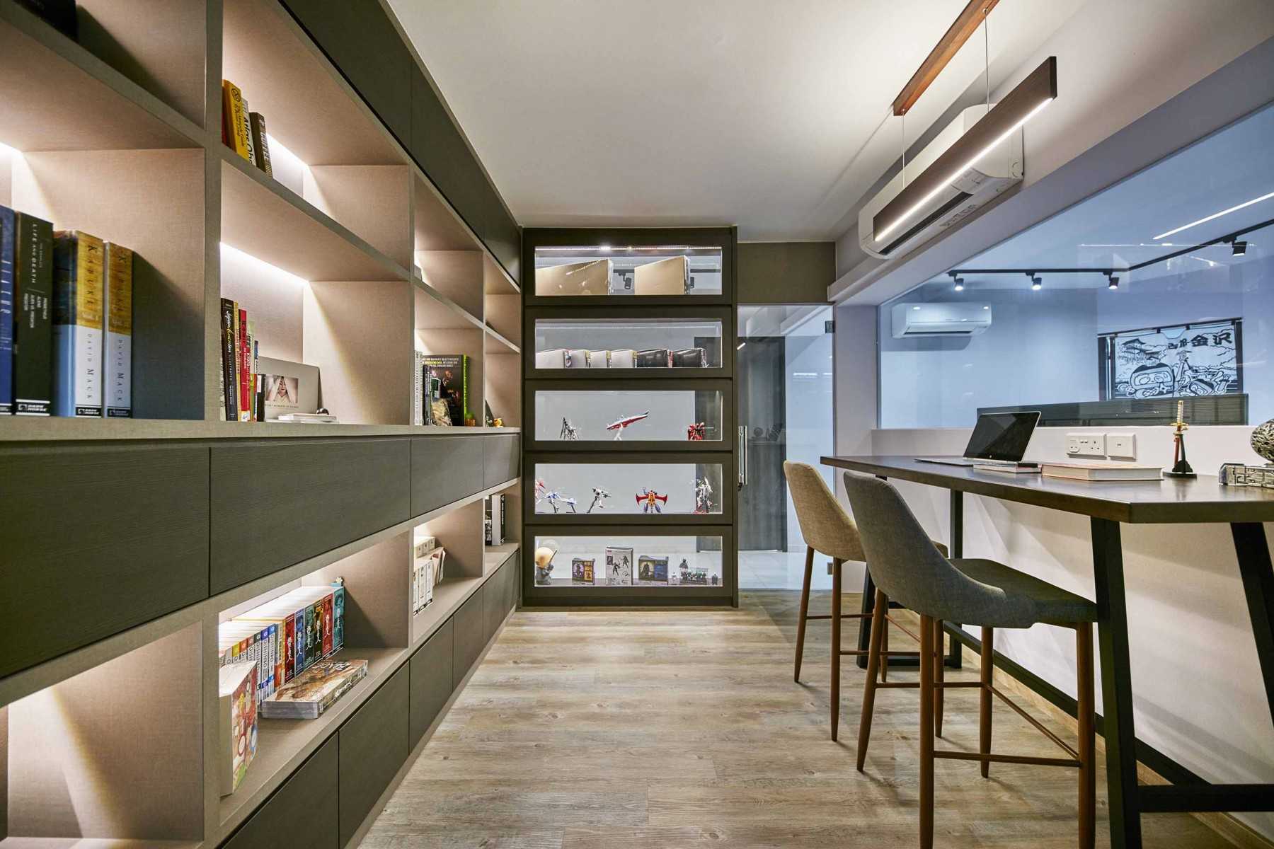 Asian Home Office with Bookshelf and Cove Lighting
