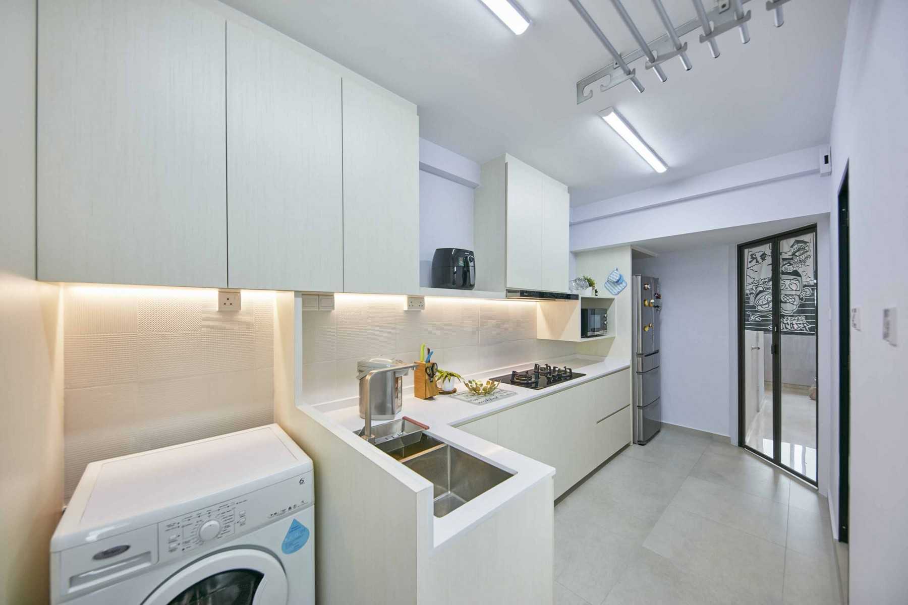 Asian Kitchen with Countertop and Cove Lighting