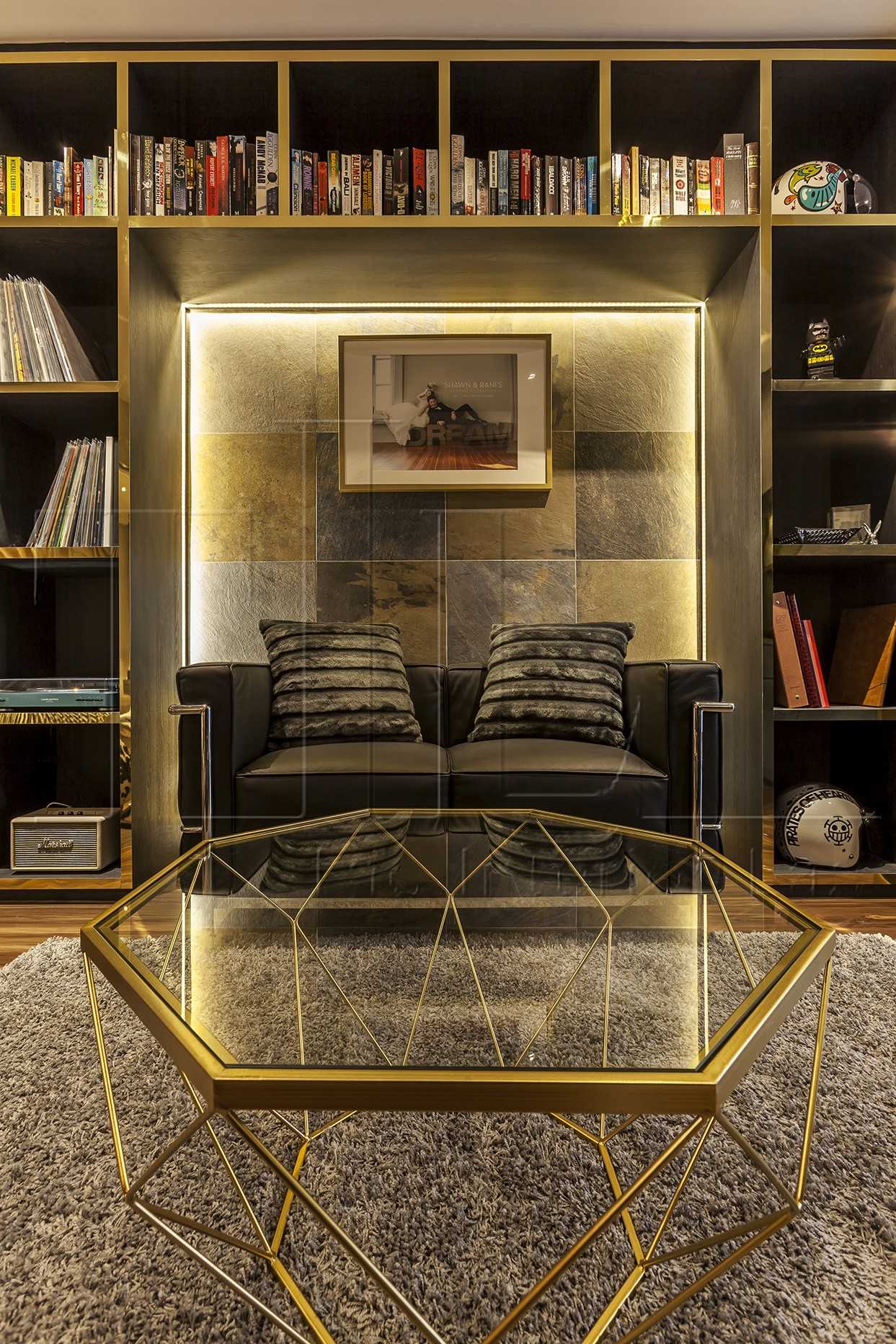 Modern Living Room with Bookshelf and Feature Wall