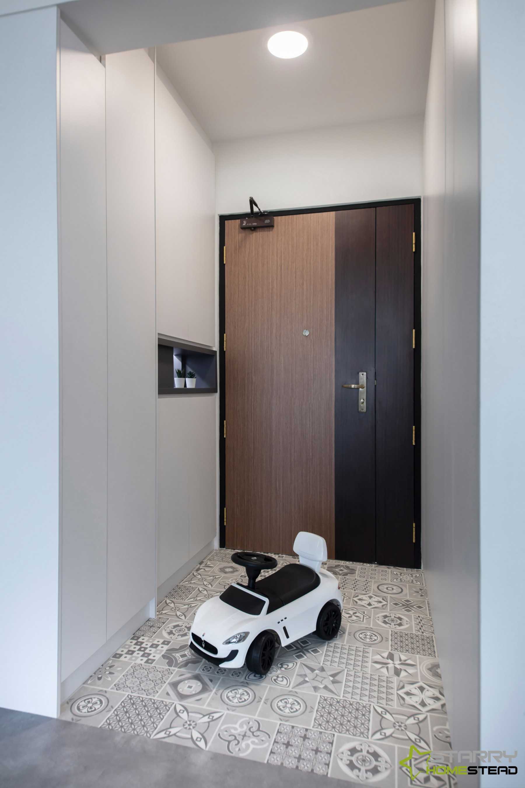 Industrial Entryway with Shoe Cabinets and Doors