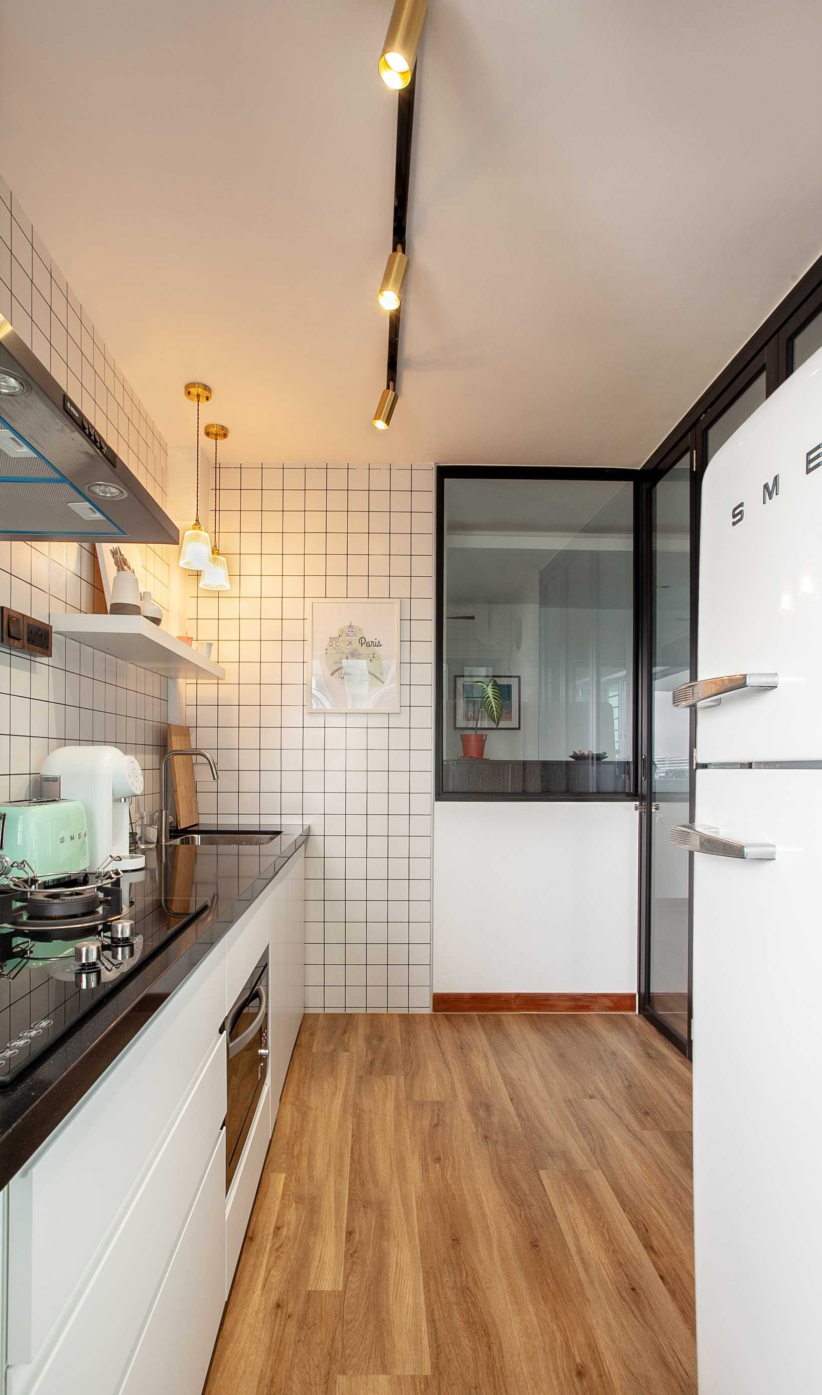 Transitional Kitchen with Countertop and Refrigerator