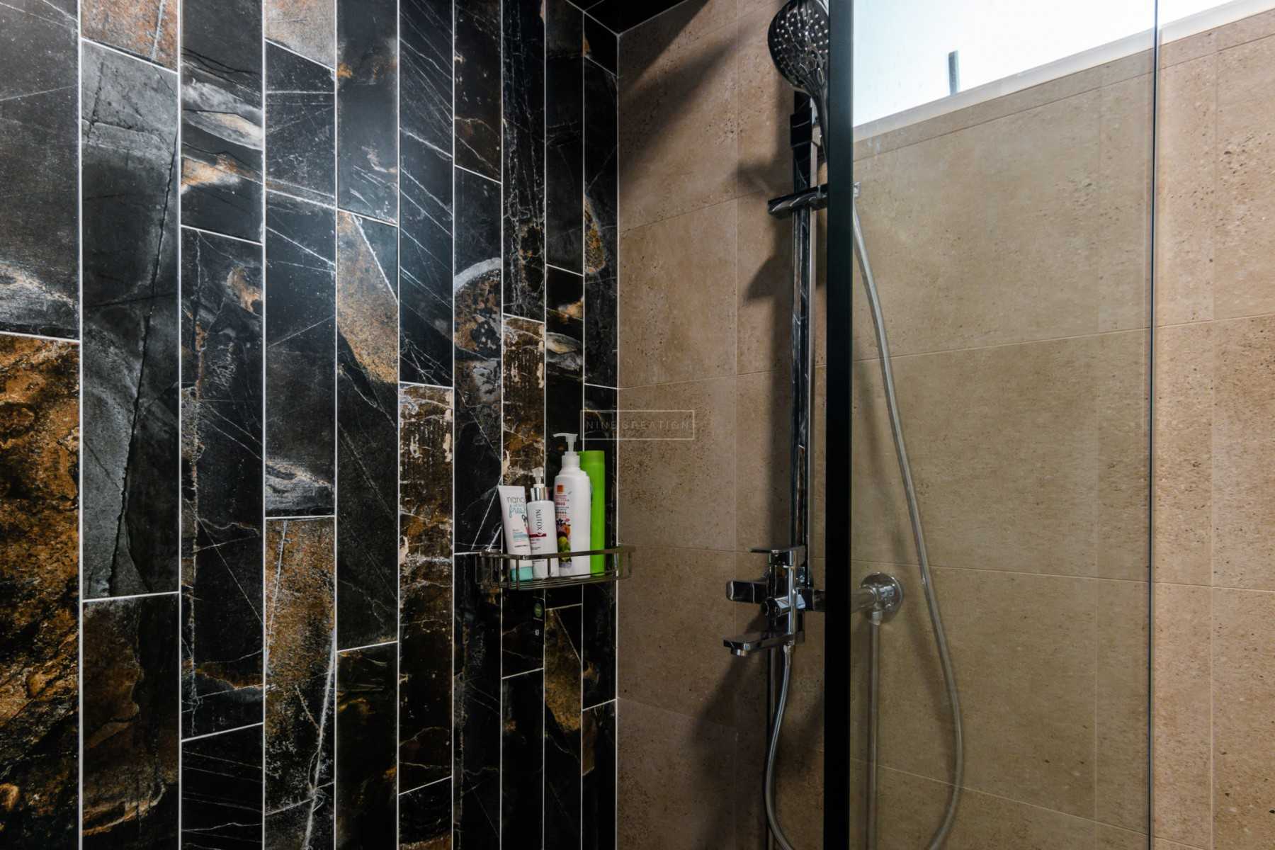 Minimalist Bathroom with Homogeneous Tiles and Shower Screen