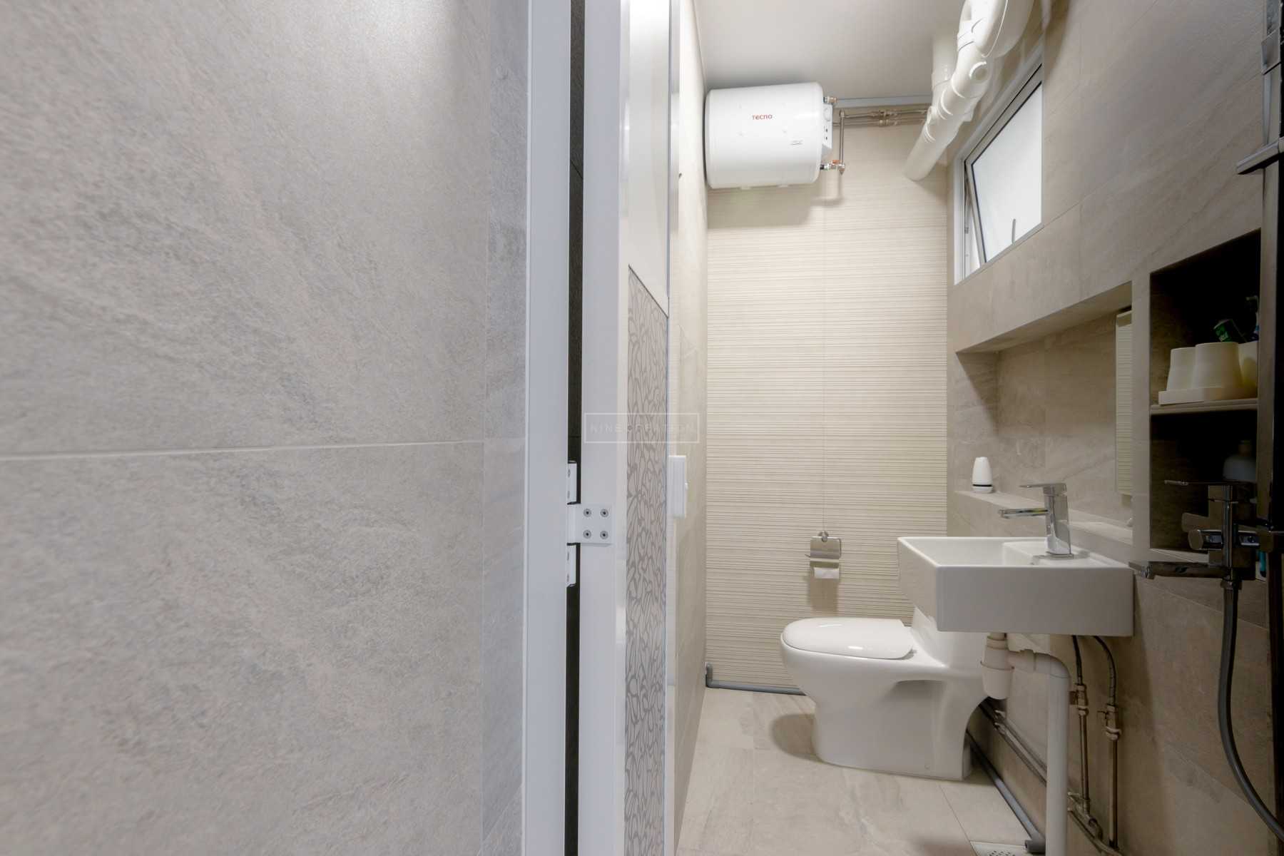 Minimalist Bathroom with Mirror and Shower Screen