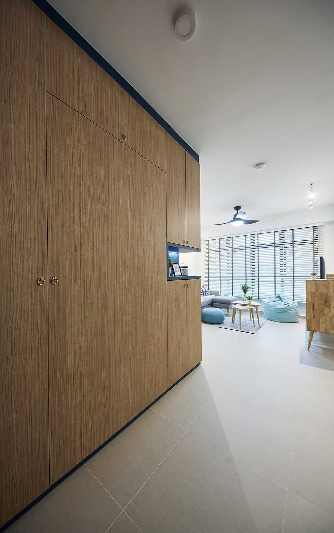 Eclectic Entryway with Storage Cabinets and Small Storage