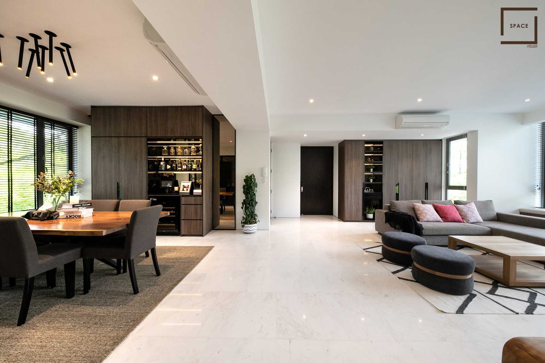 Contemporary Dining Room with Drop Light and Sofa