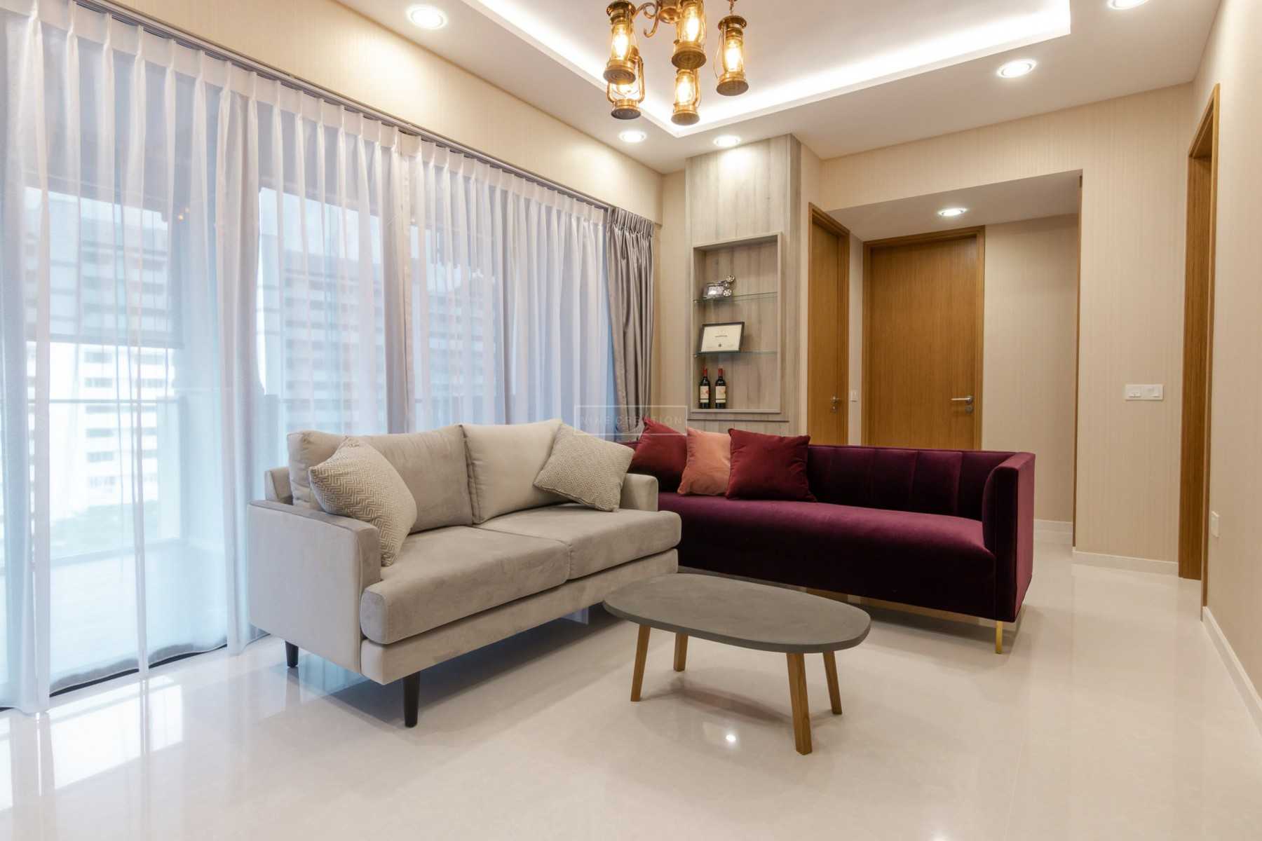 Modern Living Room with Bookshelf and Cove Lighting