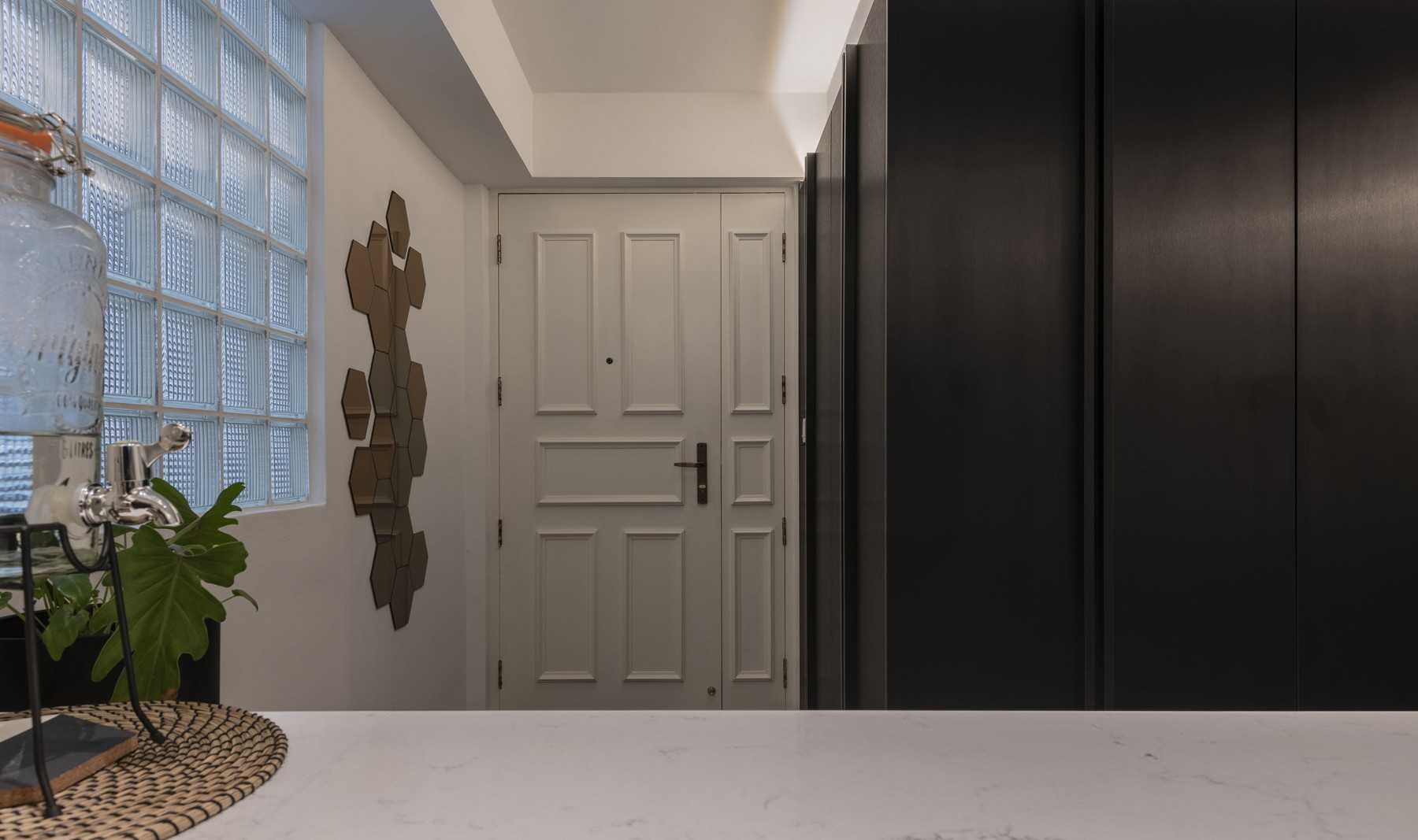 Vintage Foyer with Mirror and Artwork
