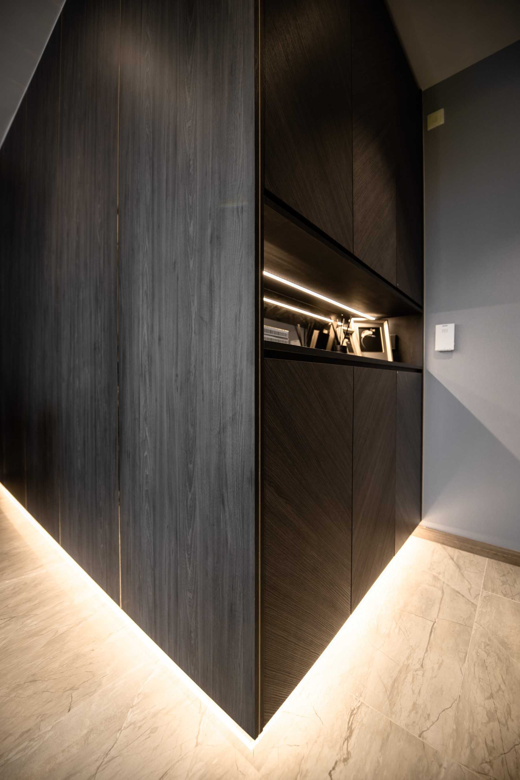 Contemporary Entryway with Marble Floor and Cove Lighting