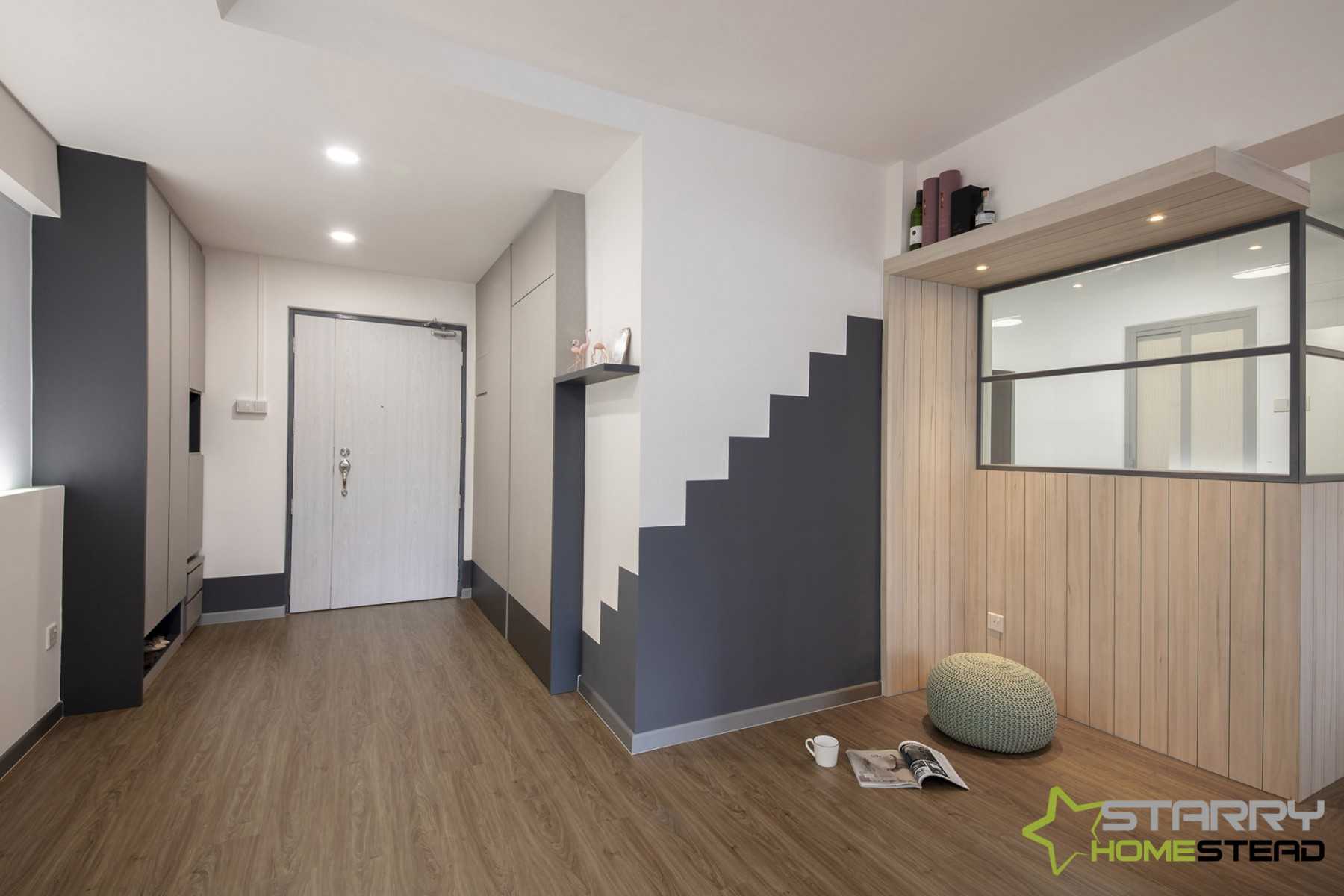 Scandinavian Entryway with Shoe Cabinets and Doors