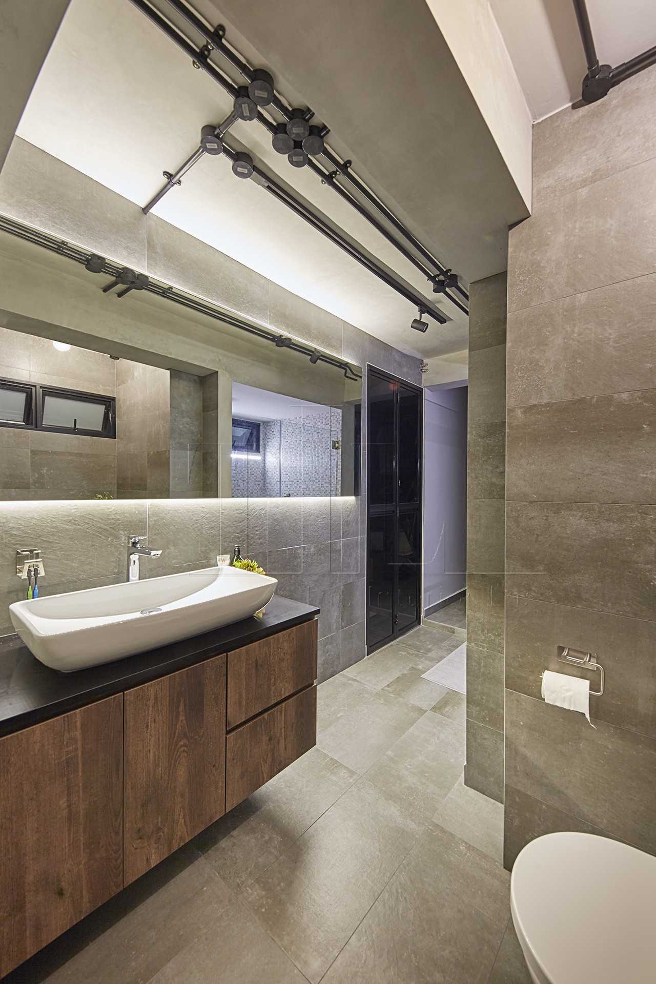 Industrial Bathroom with Mirror and Cove Lighting