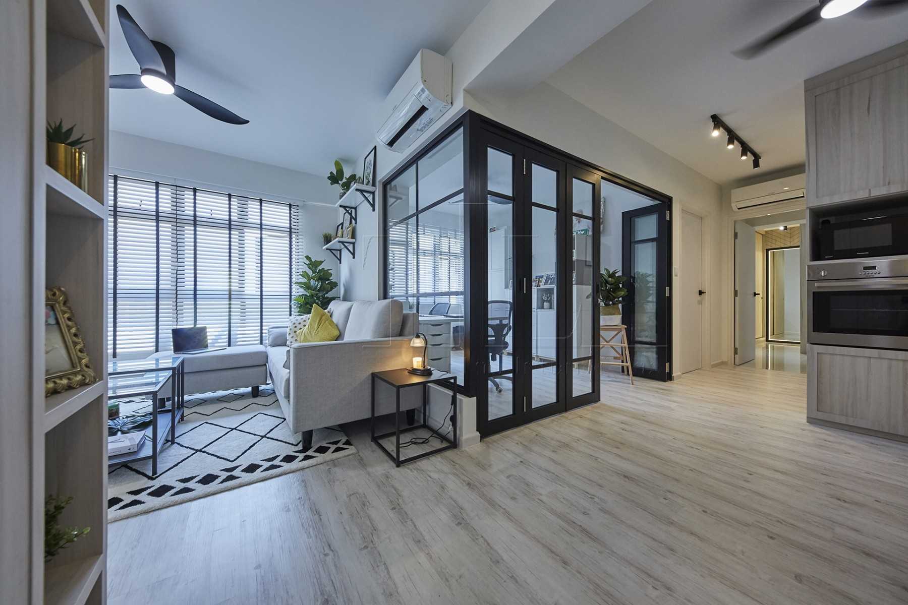 Minimalist Foyer with Wood Flooring and Glass Door