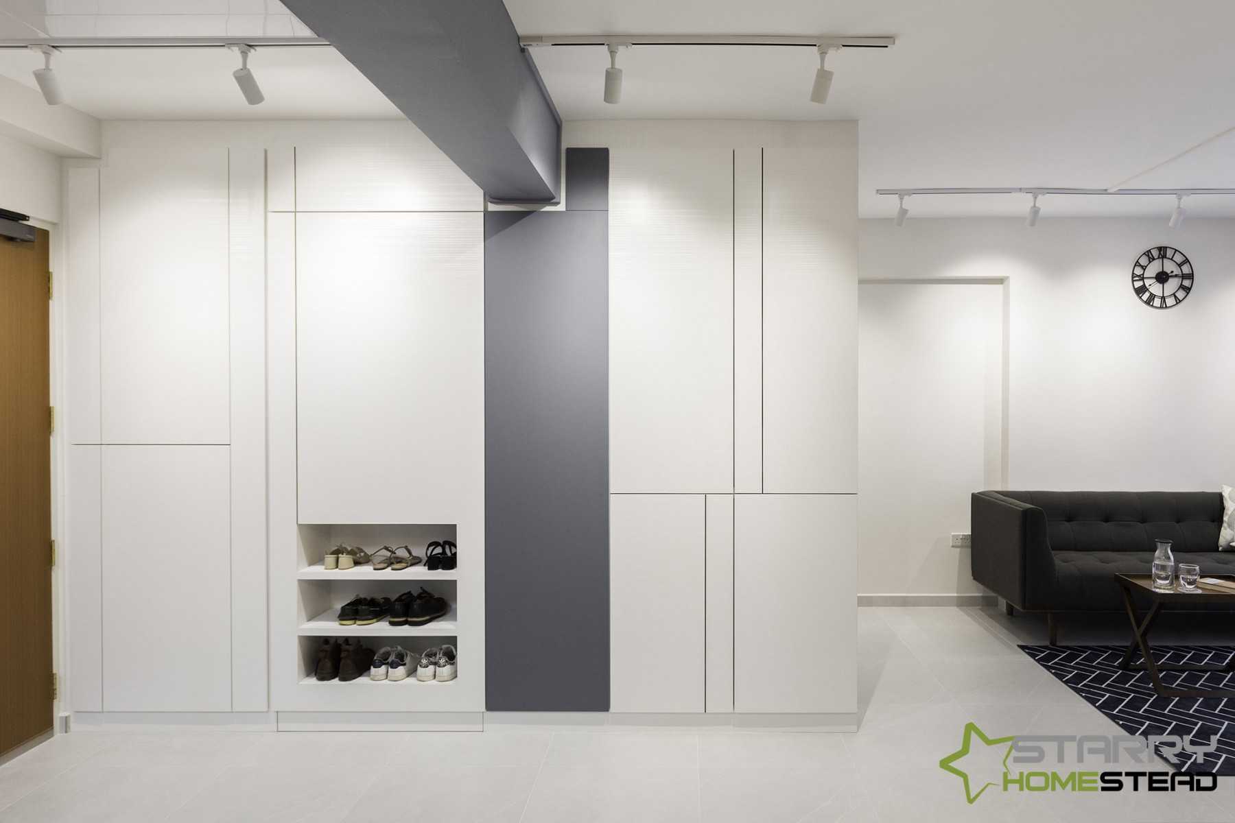 Contemporary Entryway with Shoe Rack and Storage Cabinets
