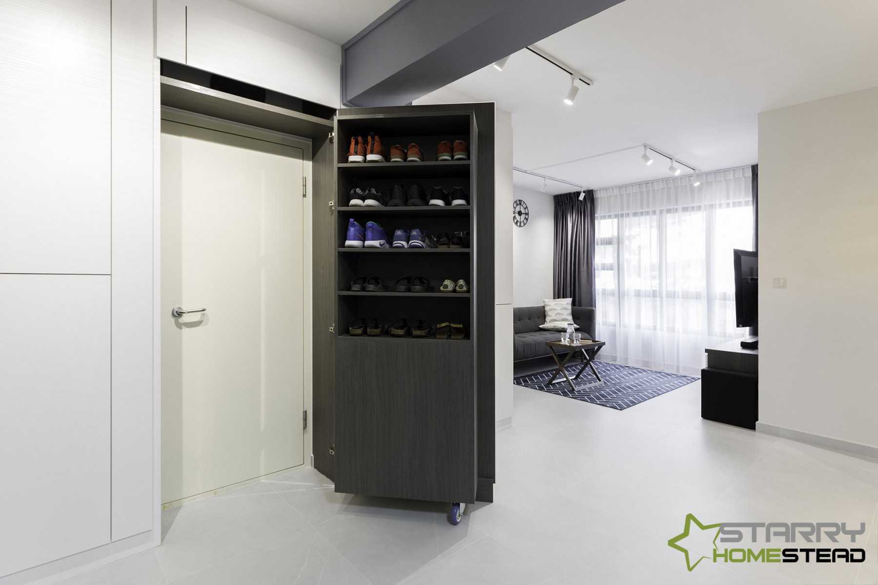 Contemporary Entryway with Shoe Cabinets and Doors