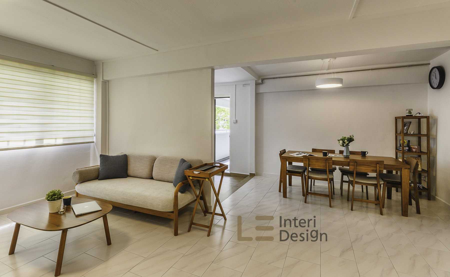 Scandinavian Living Room with Homogeneous Tiles and Sofa