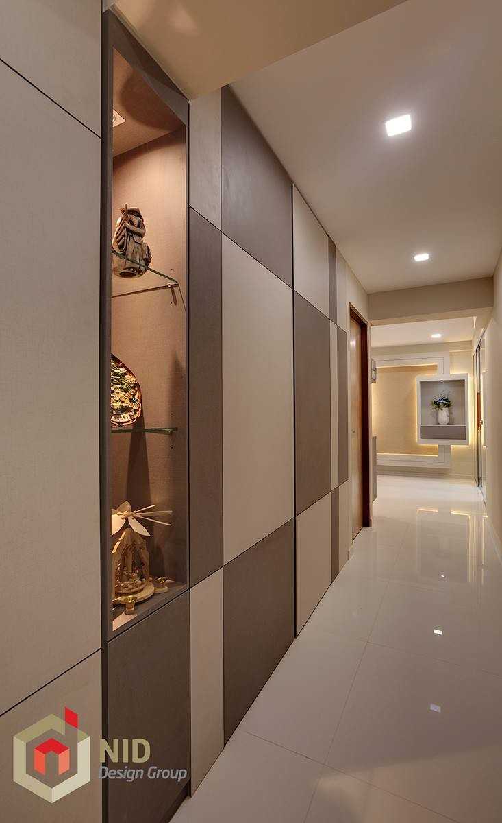 Modern Foyer with Feature Wall and Display Cabinets