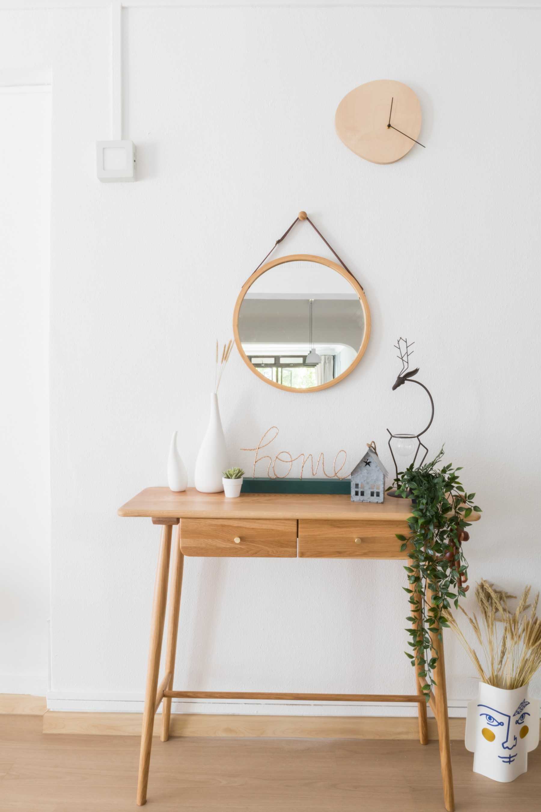 Scandinavian Entryway with Mirror and Console Table
