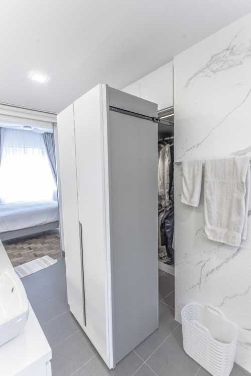 Minimalist Walk-in Wardrobe at Maplewood