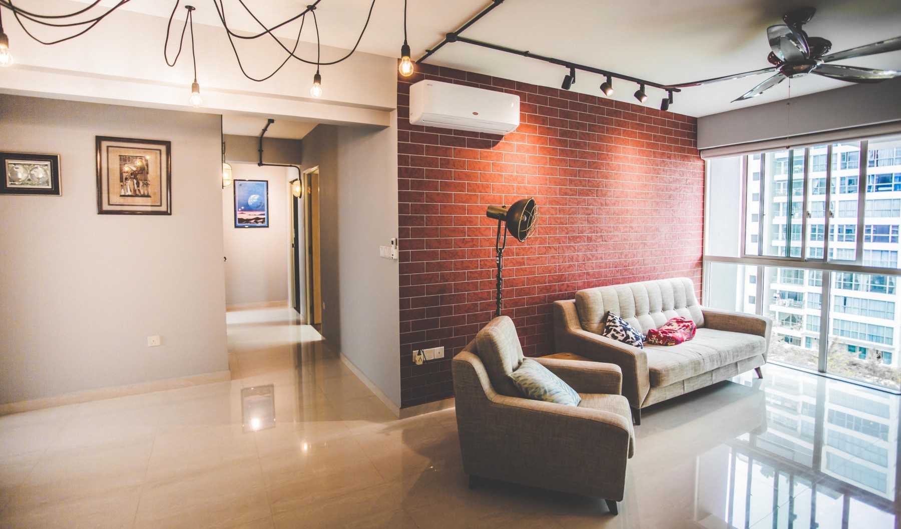 Industrial Living Room with Feature Wall and Paintings