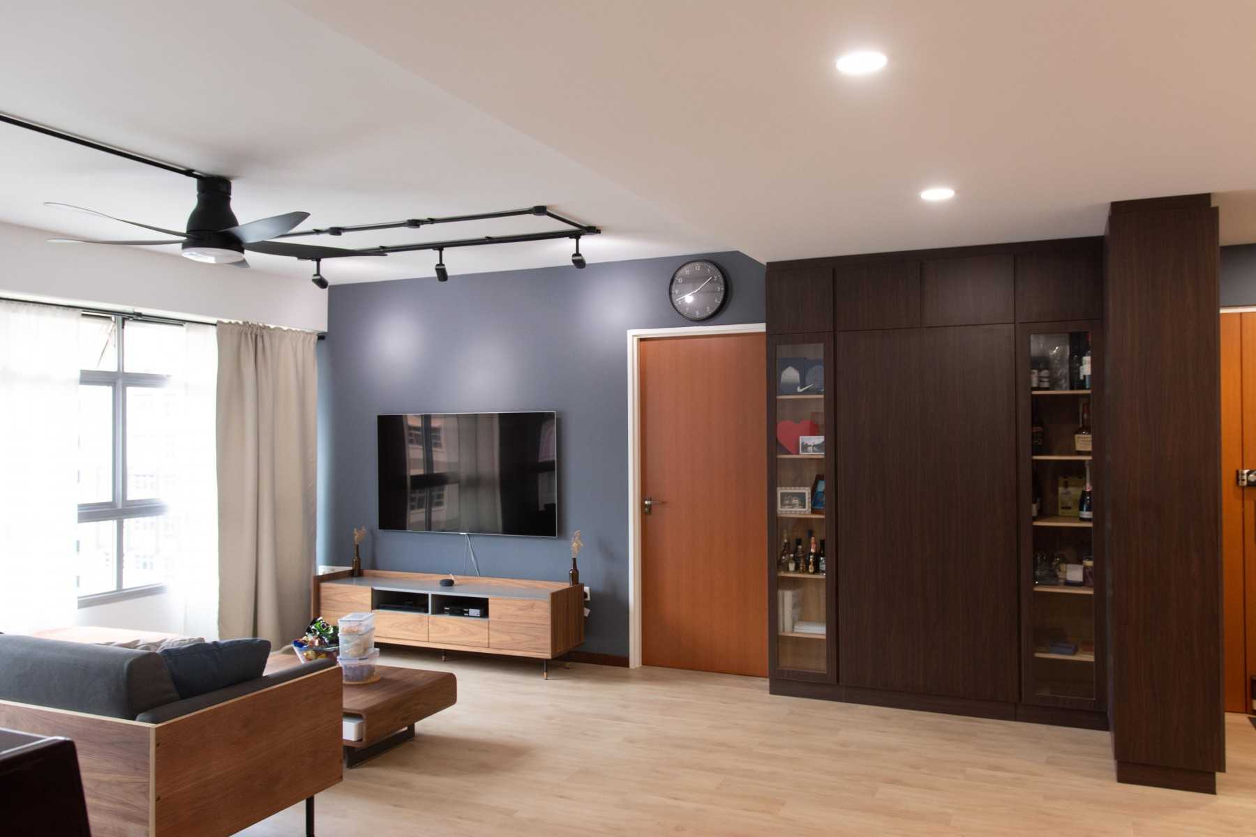 Modern Living Room with Bookshelf and TV Console