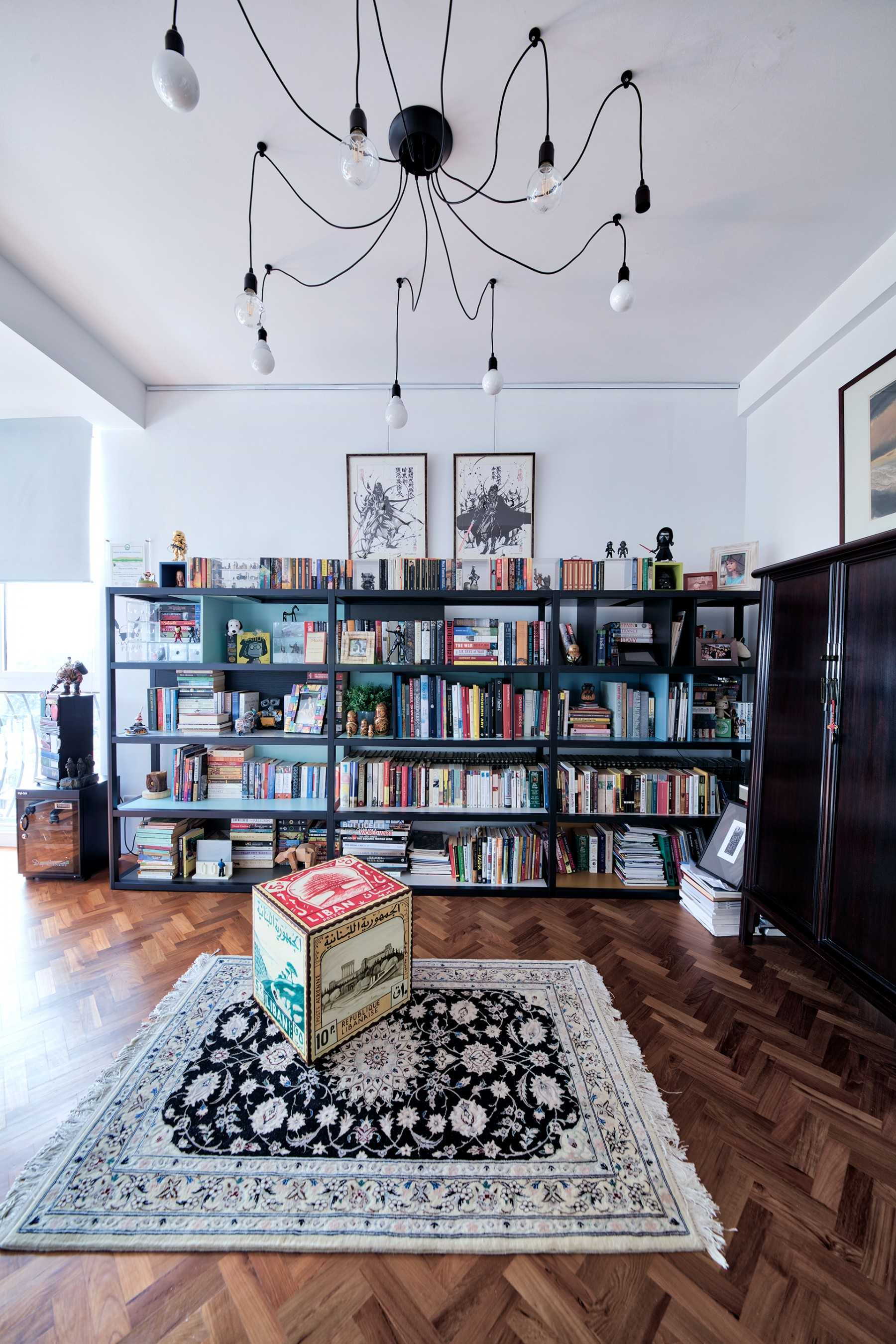 Contemporary Study with Bookshelf and Wood Flooring