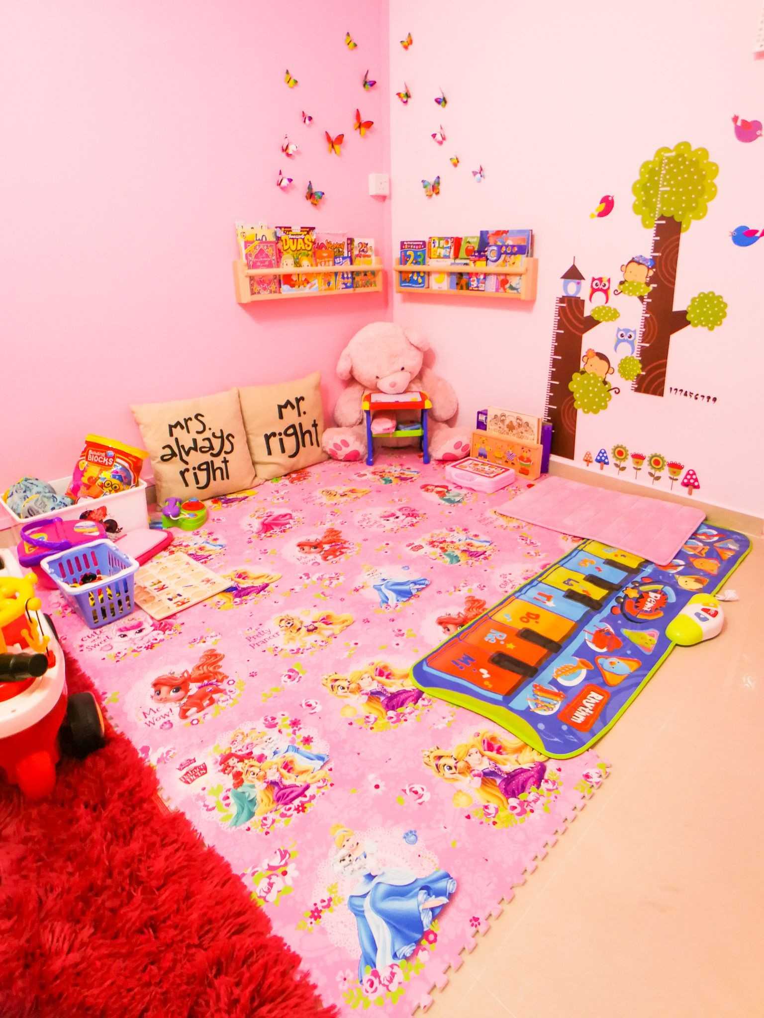 Asian Kids Room with Carpet and Paintings