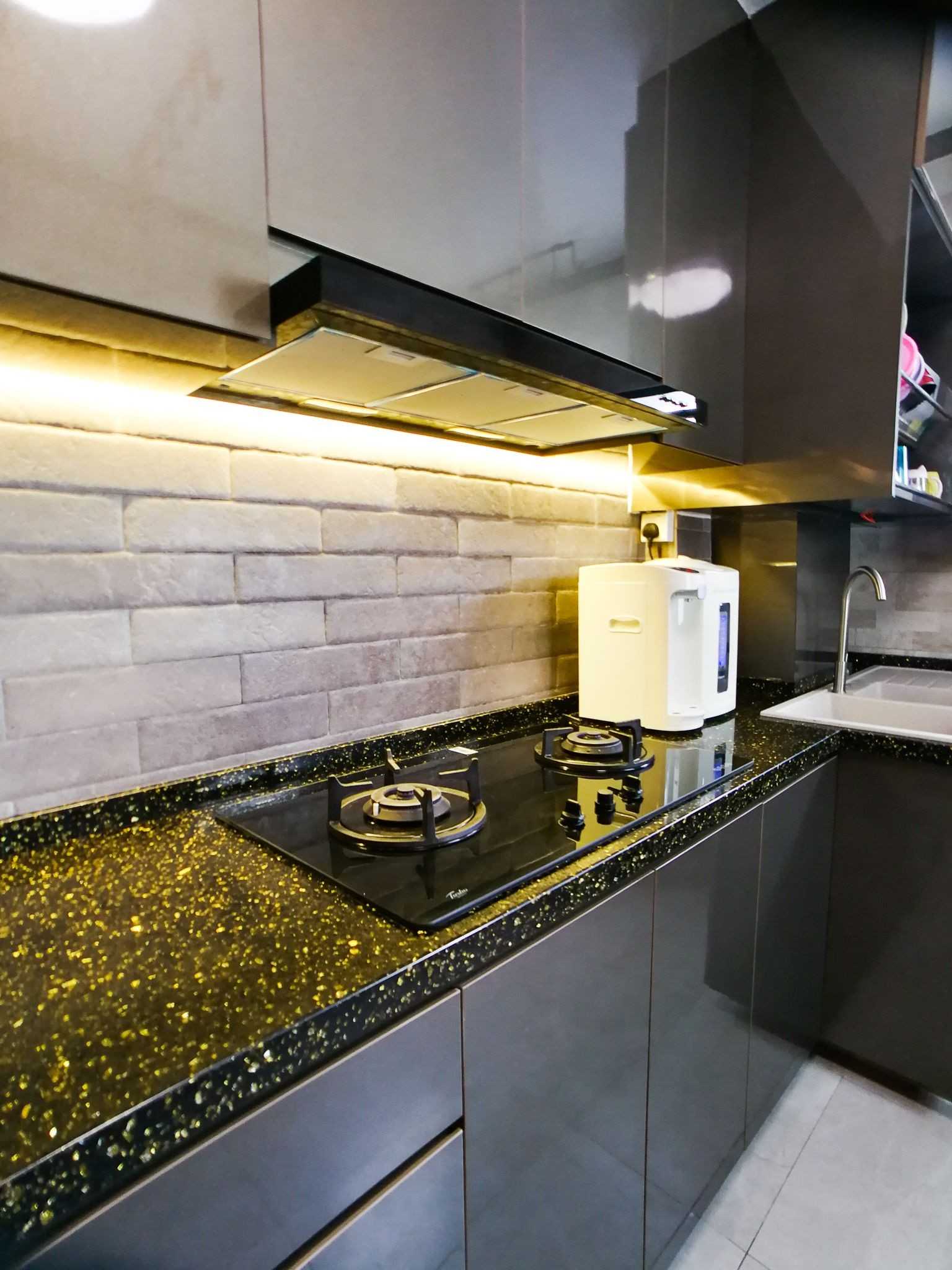 Asian Kitchen with Countertop and Feature Wall